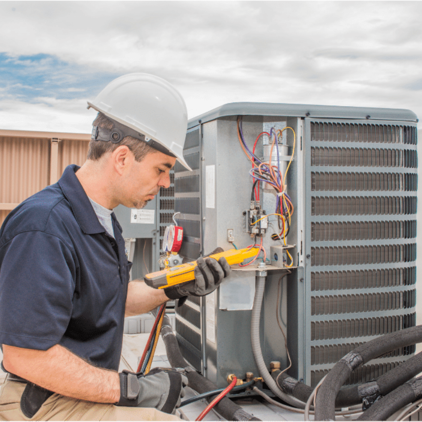 Ridgetown Heating & Cooling HVAC technician on a service call in Ridgetown, Ontario