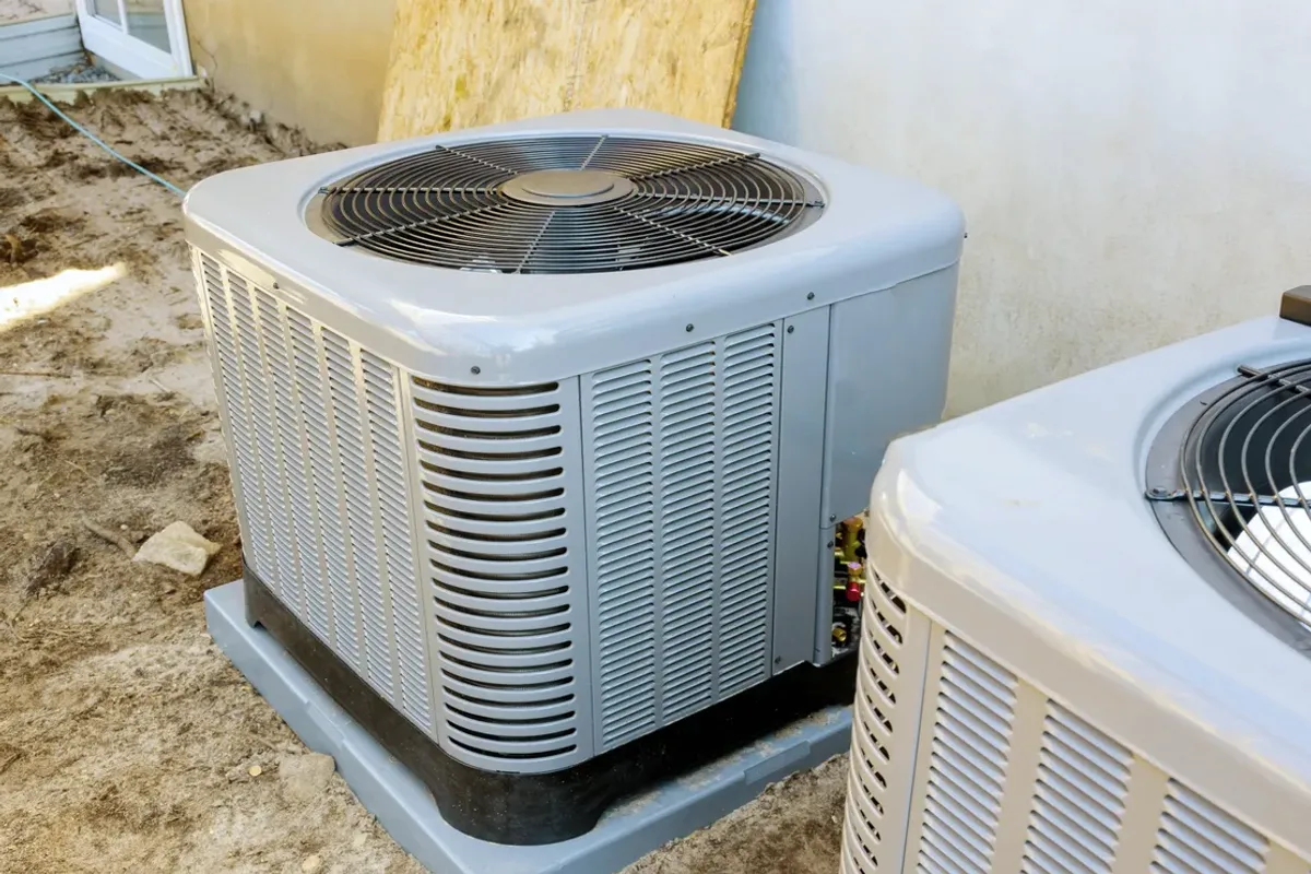 Two outdoor air conditioner condensers